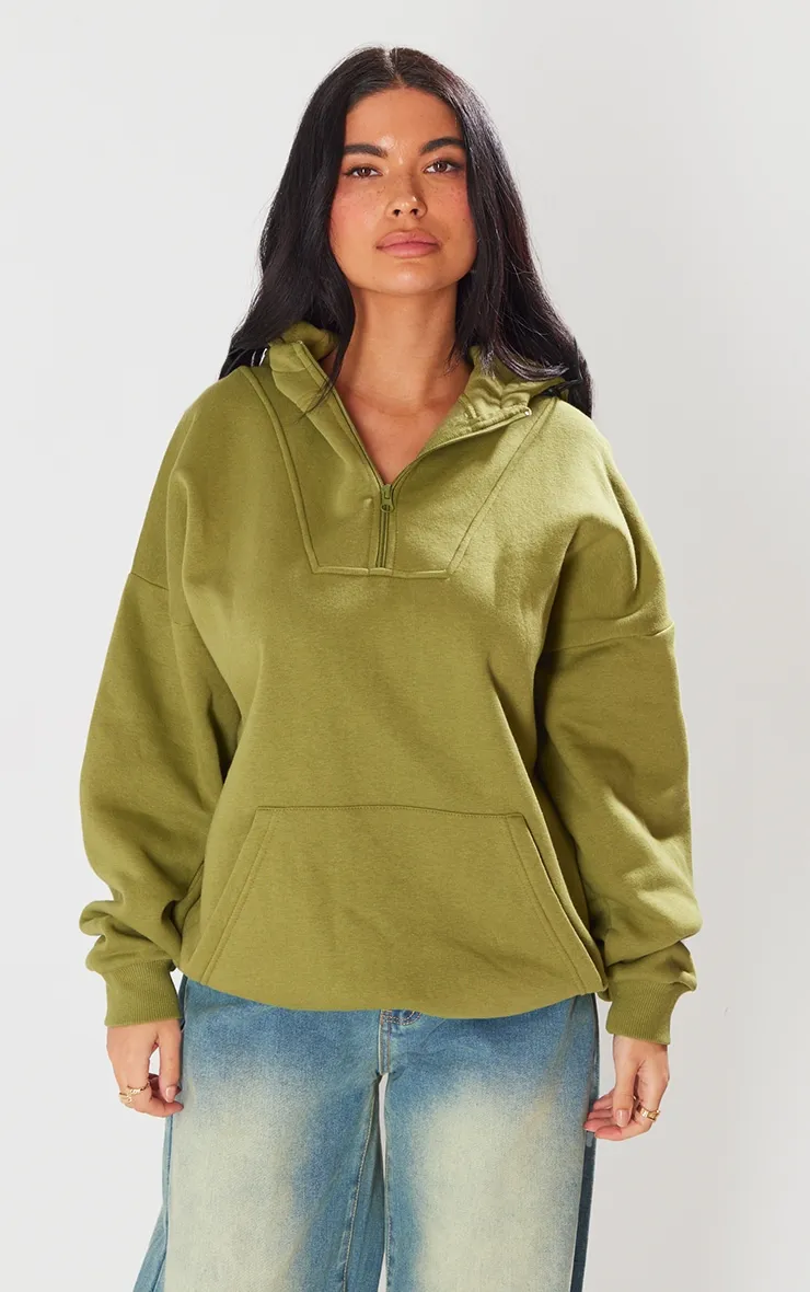 Hoodie vert olive à demi-zip et coutures apparentes